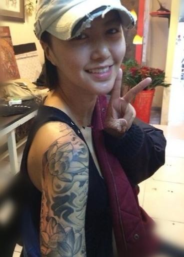 谭维维纹身花臂是什么（谭维维身上纹身是真的吗）