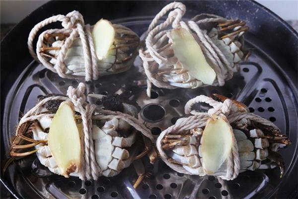 蒸螃蟹是水开后15分钟吗 蒸螃蟹会跑出来怎么办